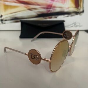 Dolce and Gabbana Authentic New rose gold sunglasses.